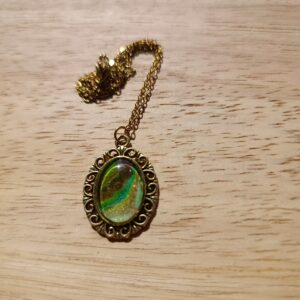 Zawieszka owalna – „retro”. Wymiary: 18 mm x 12 mm